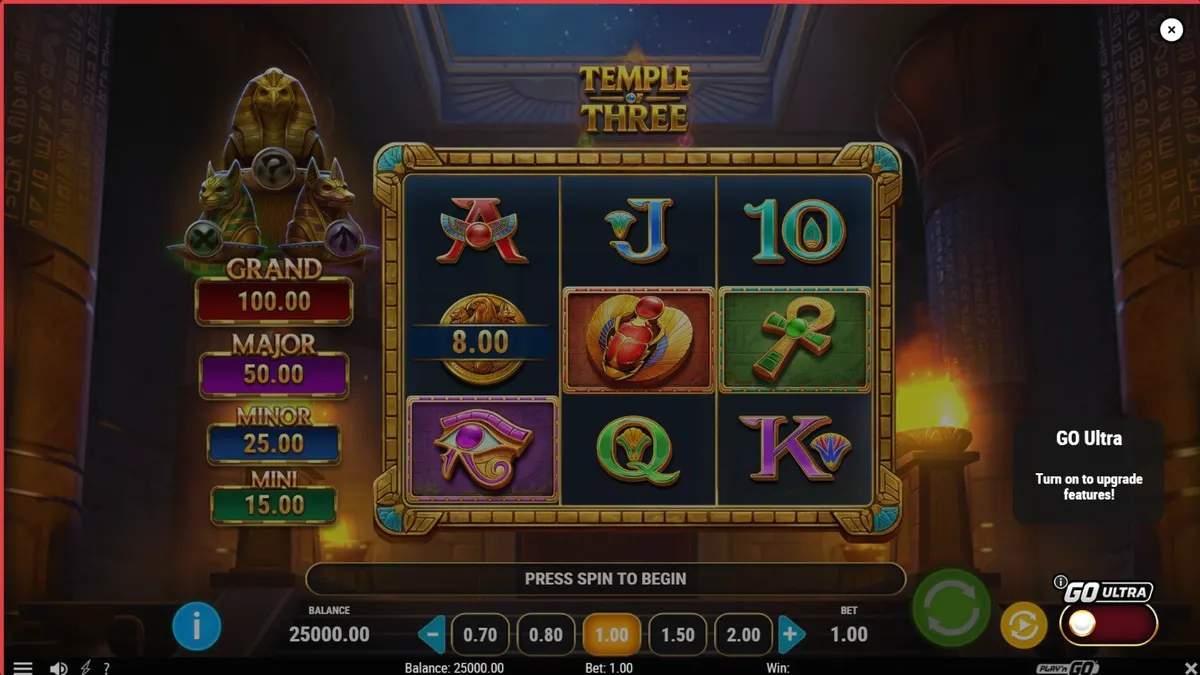 Tampilan visual slot Temple of Three dengan latar belakang makam Mesir Kuno yang megah.